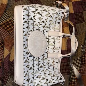 Super Cute clear logo splashed Michael Kors tote. Barely used Color: white